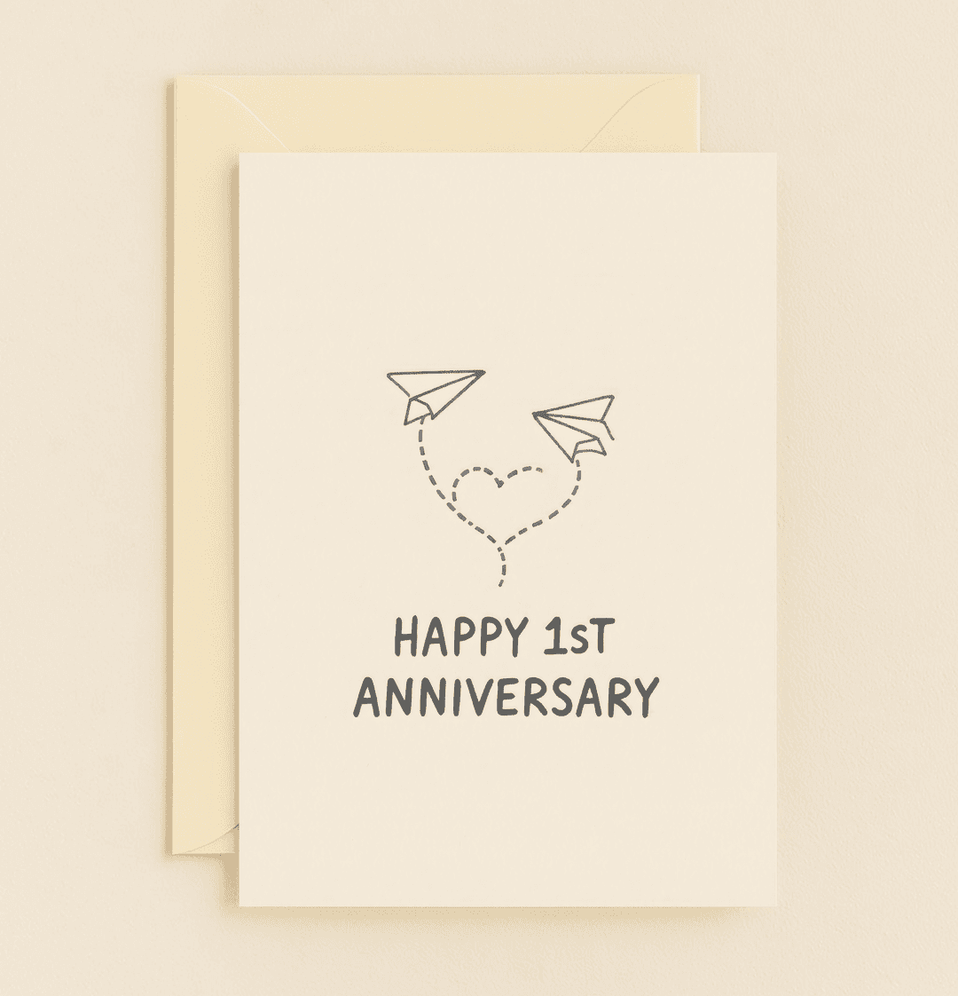 Celebrate your 1st anniversary with this charming minimalist card, featuring playful paper airplanes soaring into a heart, perfect for love that takes flight.