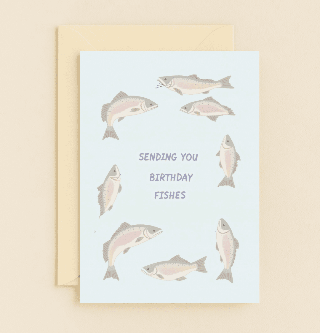Dive into a fin-tastic birthday with this whimsical card featuring playful trout illustrations and punny "birthday fishes" wishes on a soft aqua background.