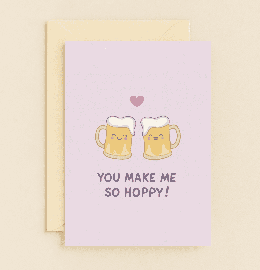 Celebrate your anniversary with this playful card featuring cheerful beer mugs and a heart, perfectly capturing the joy of being "hoppy" together!.