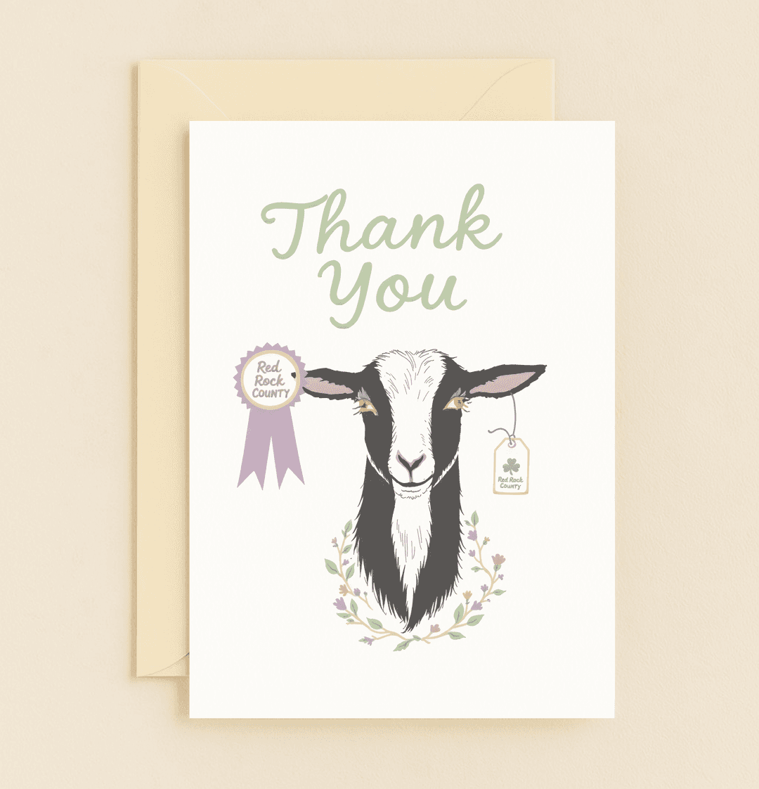 Thank someone special with this playful "Goat Gratitude" card, featuring a charming goat, pastel floral wreath, and award ribbon for the G.O.A.T. in your life!.