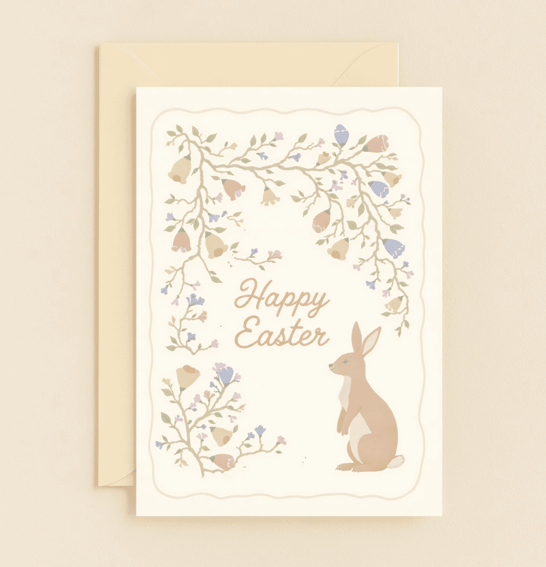 Celebrate Easter with a whimsical card featuring a pastel bunny and blossoming branches, capturing the essence of spring's gentle charm.