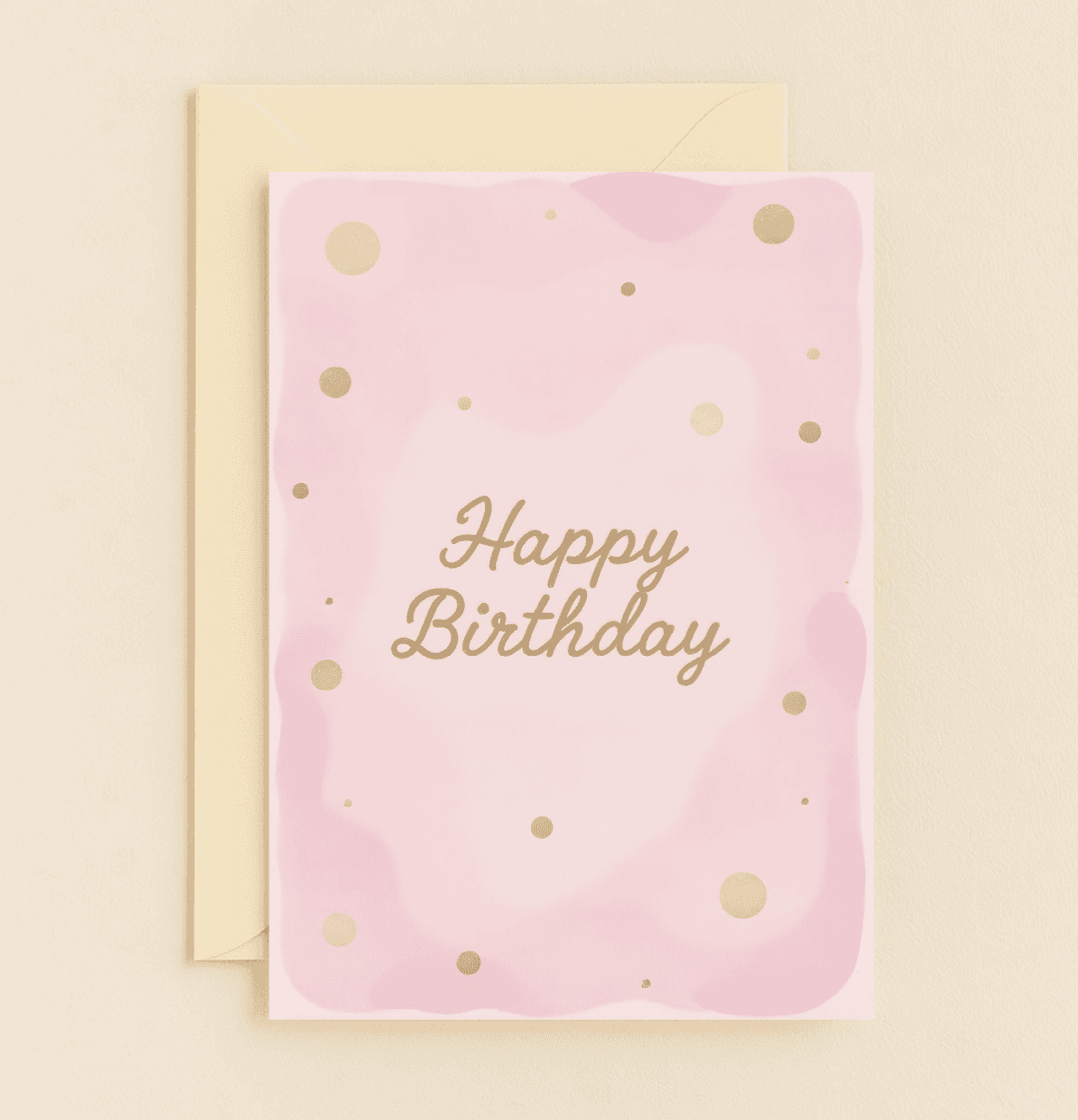 Celebrate a special day with elegance and charm using our "Golden Wishes on a Pink Canvas" birthday card, featuring a pink watercolor backdrop and shimmering gold polka dots.