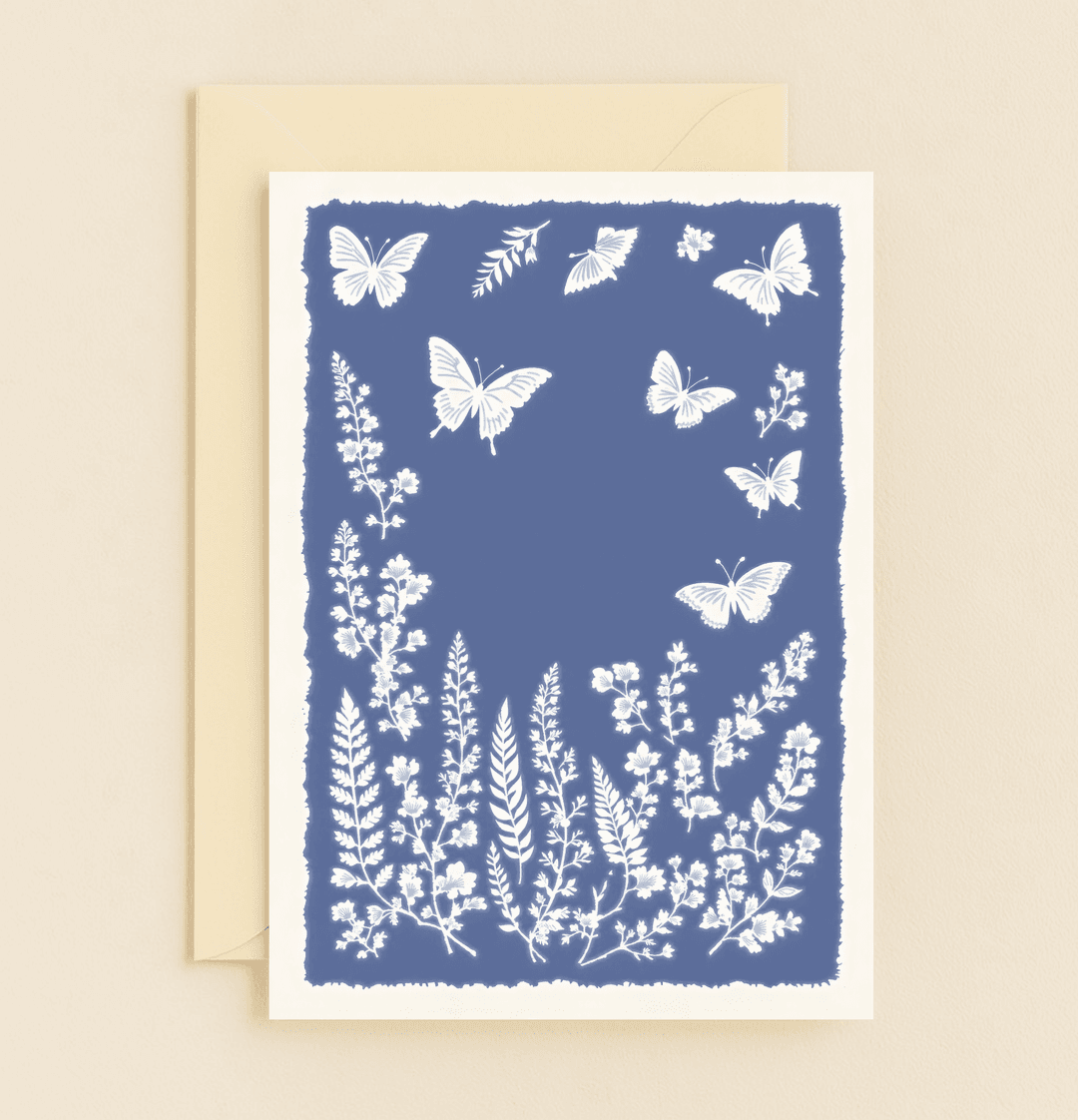 Celebrate Mother's Day with "Ethereal Blooms and Butterfly Whispers," a serene silhouette card featuring elegant white florals and butterflies on a deep blue canvas.
