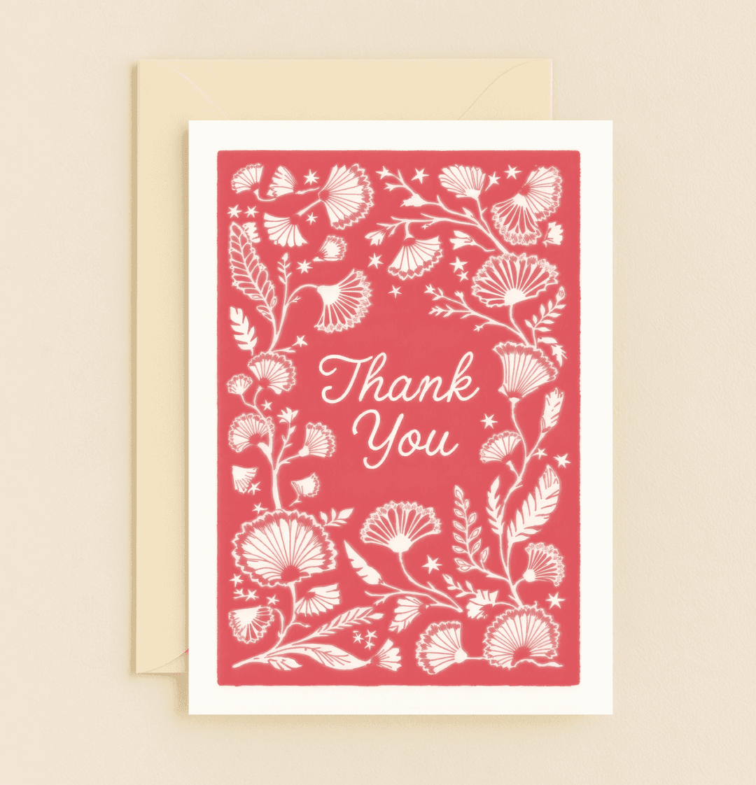 Express heartfelt thanks with the "Floral Gratitude in Scarlet" card, featuring an elegant white floral design on a vibrant red backdrop.