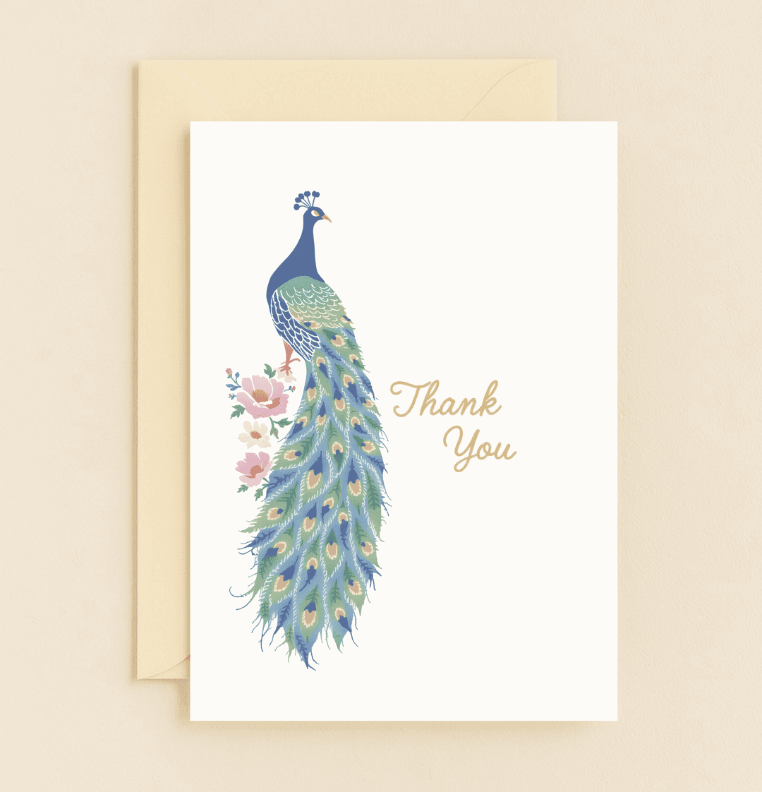 Express gratitude with this elegant card featuring a vibrant peacock and floral accents, adorned with gold calligraphy for a touch of sophistication.