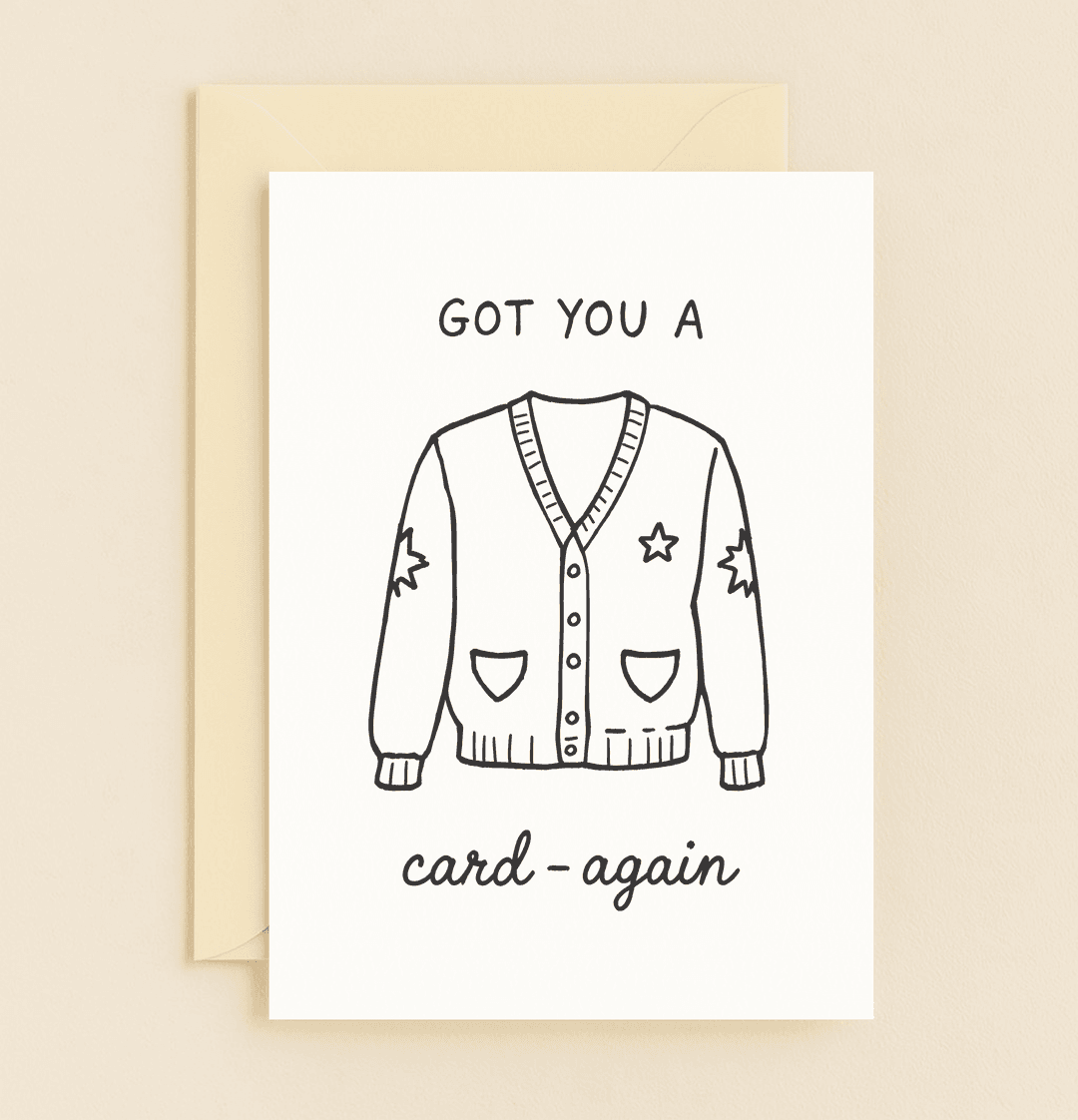 Celebrate their special day with a cozy twist using this punny "Cozy Card-again" birthday card, featuring a charming cardigan illustration and playful wordplay.