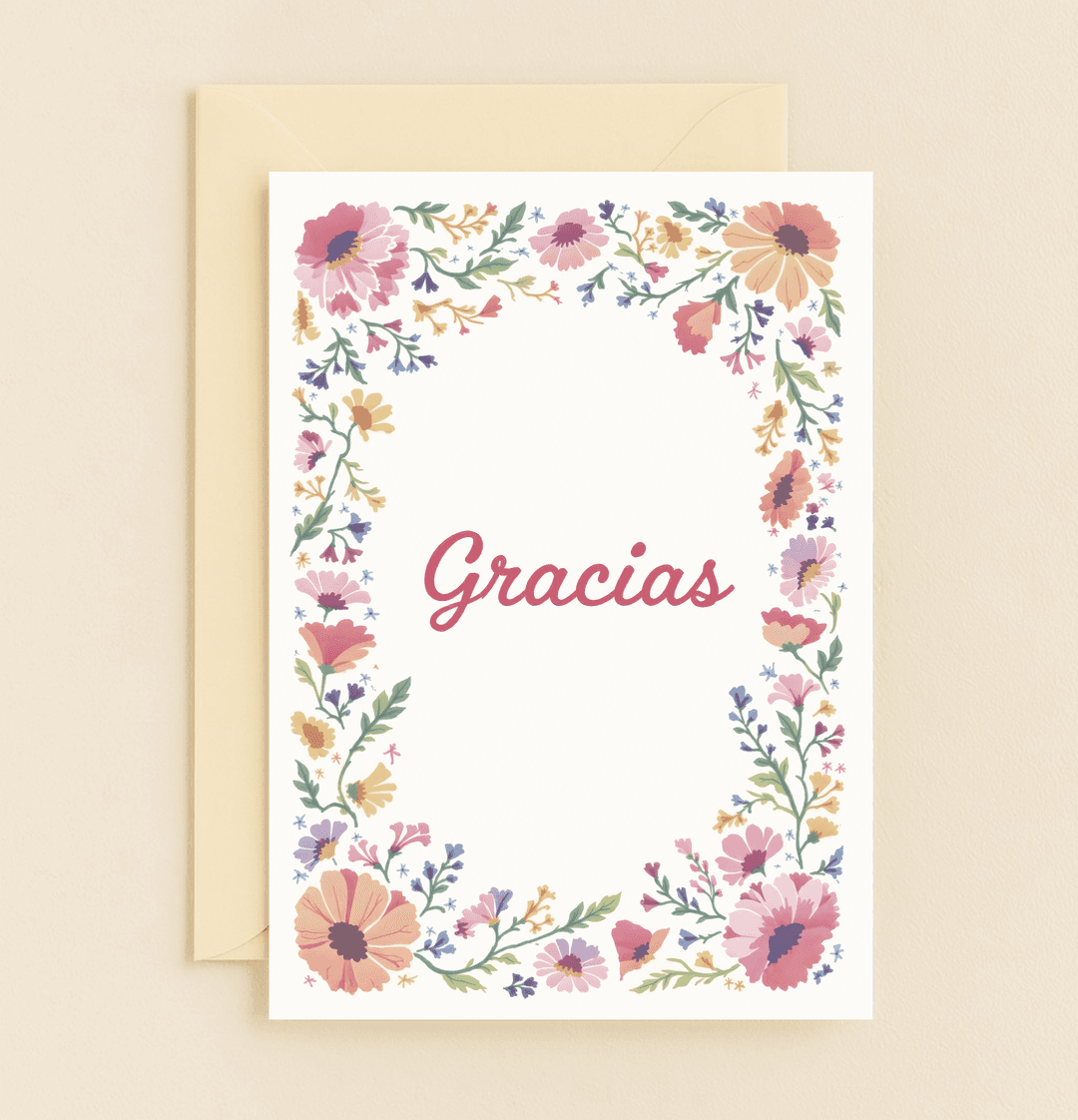 Express heartfelt thanks with "Floral Gratitude Blooms," a charming watercolor card featuring a vibrant floral border and "Gracias" in elegant red script.
