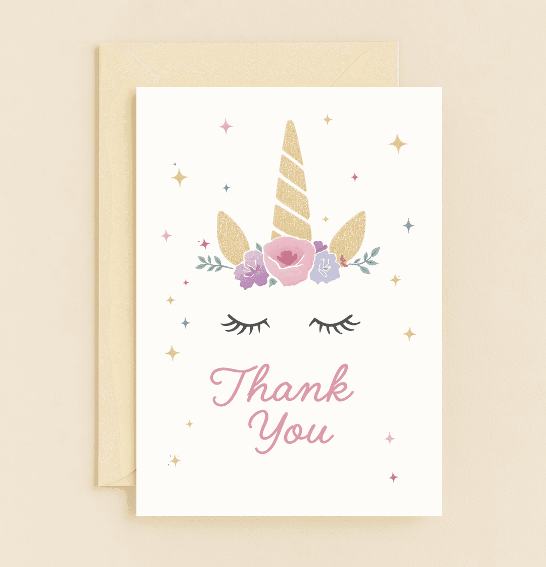 Express heartfelt thanks with this whimsical unicorn card, featuring golden glitter, pastel flowers, and serene magic for a truly enchanting gesture.