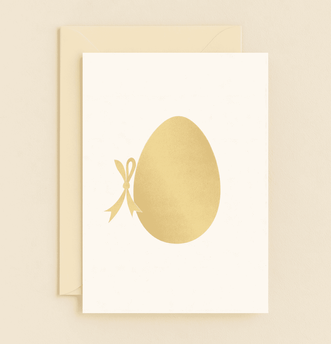 Celebrate Easter with our "Golden Egg of Spring Joy" card, featuring a luxurious minimalist design of a shiny golden egg adorned with a sleek ribbon bow.