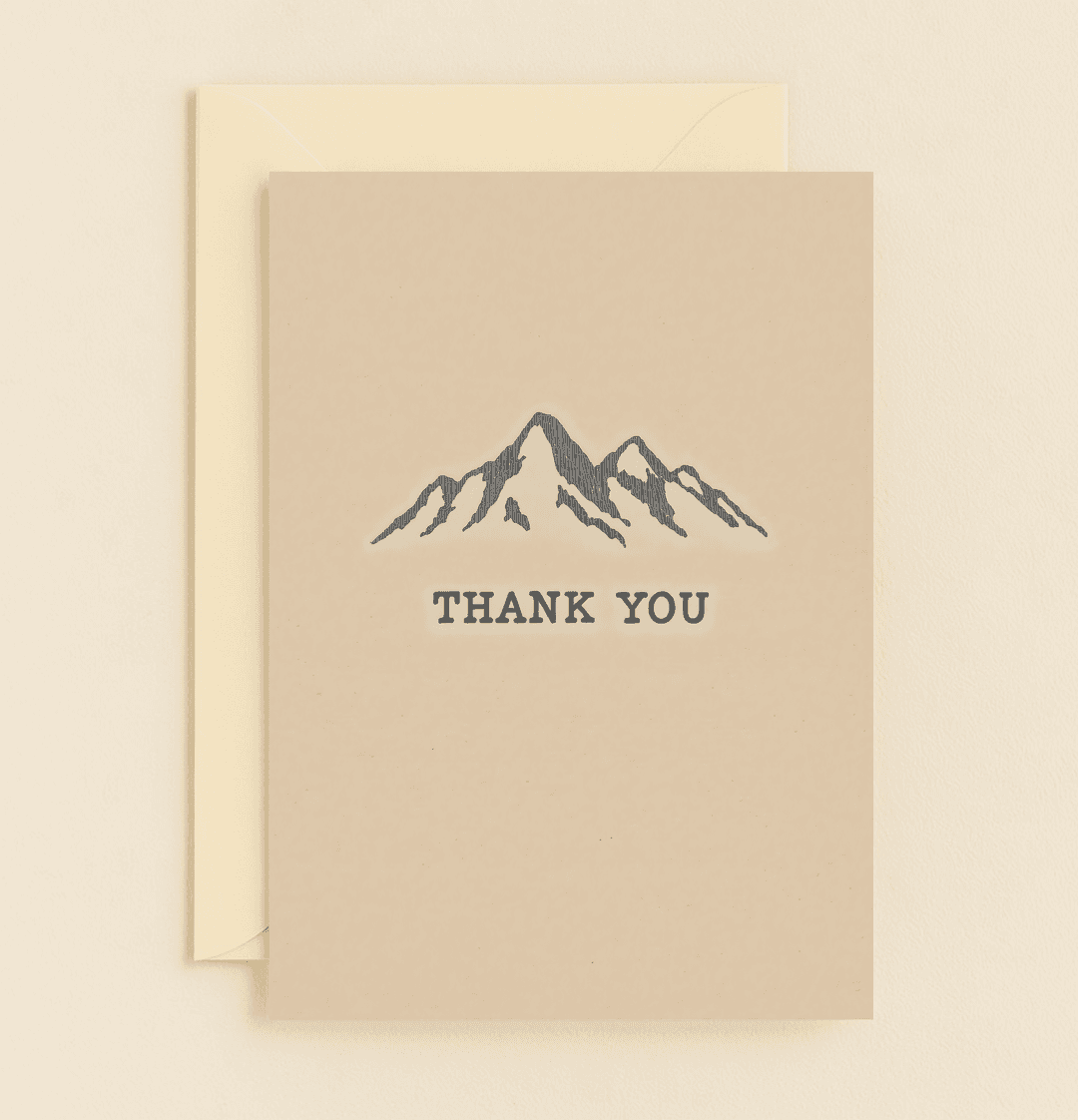 Express your thanks with a touch of humor through our "Peaks of Gratitude" card, featuring a sketched mountain range on a soothing beige backdrop.