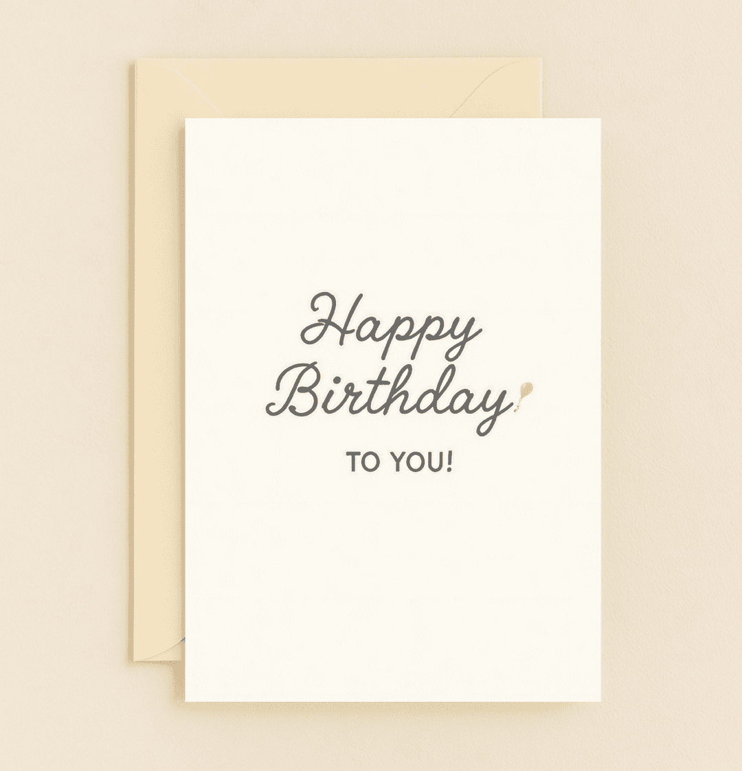 Celebrate birthdays with style and simplicity using this minimalist card featuring elegant cursive and a playful yellow balloon.